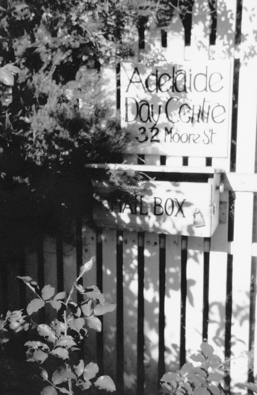 Picket gate with the words Adelaide Day Centre.