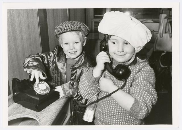 Messenger press collection - You dial and I'll do the talking. Jarrod and Jessica, both 4, on the phone at the St Peters childcare centre, 1988. SLSA: B 70869/11977