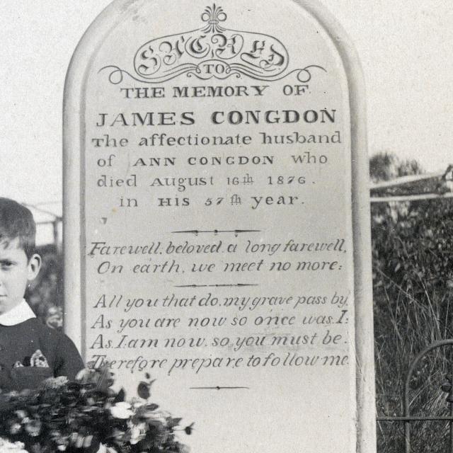 Alfred Congdon, oldest son beside the grave of James Congdon, c. 1868 - 1900 [B 150863/53]