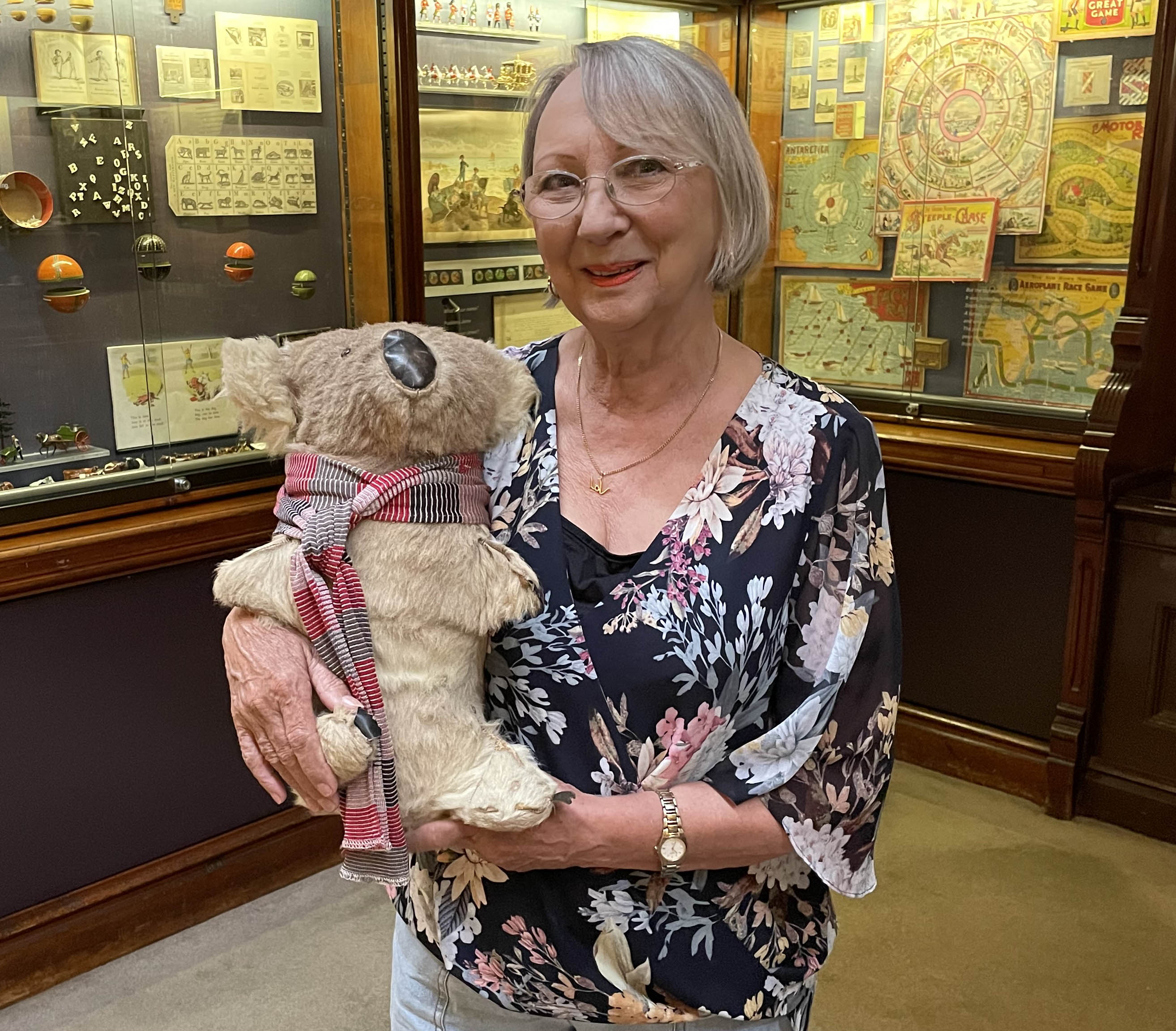 Valerie holding a koala which is wearing a scraf.jpg