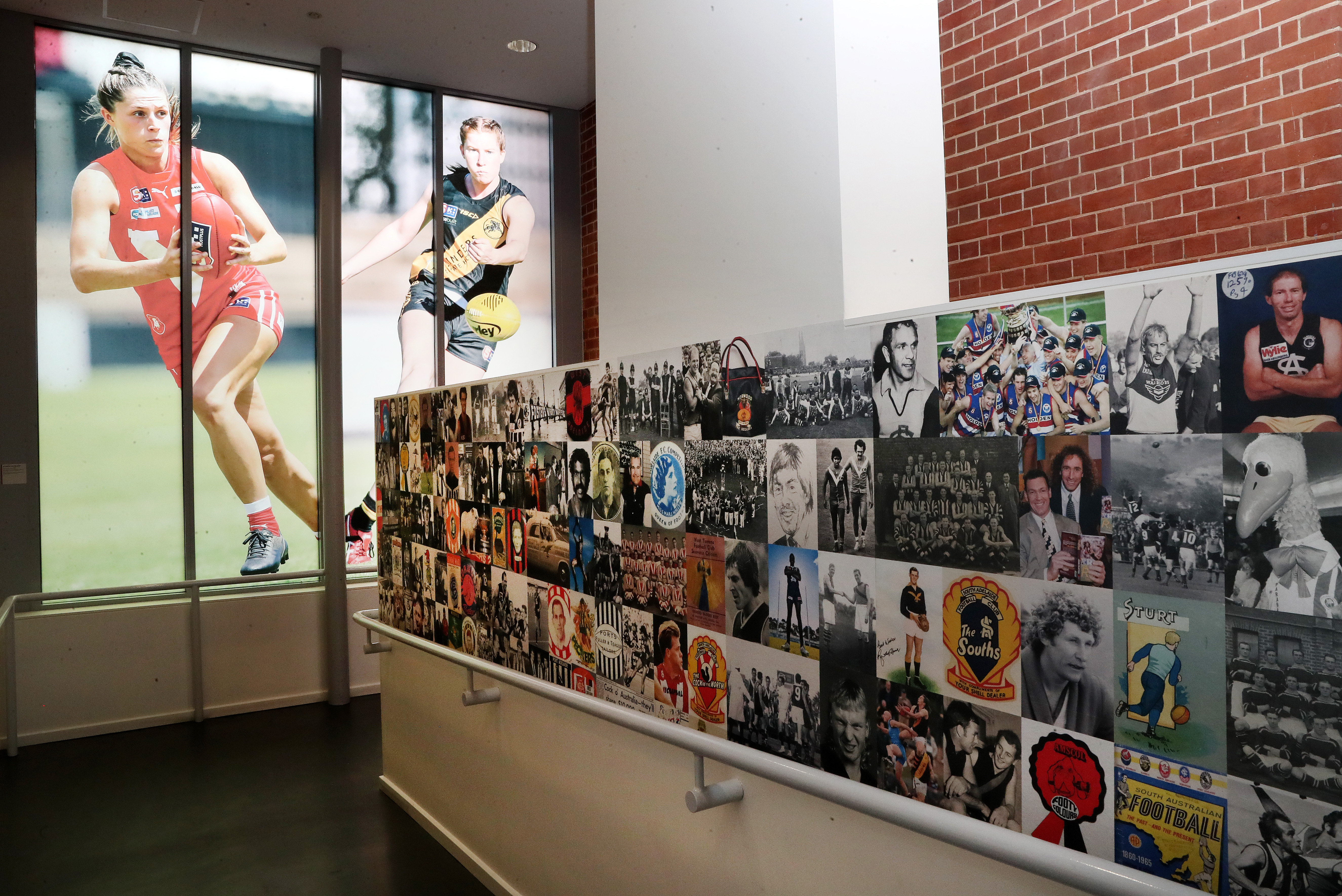 Photos of football players on display