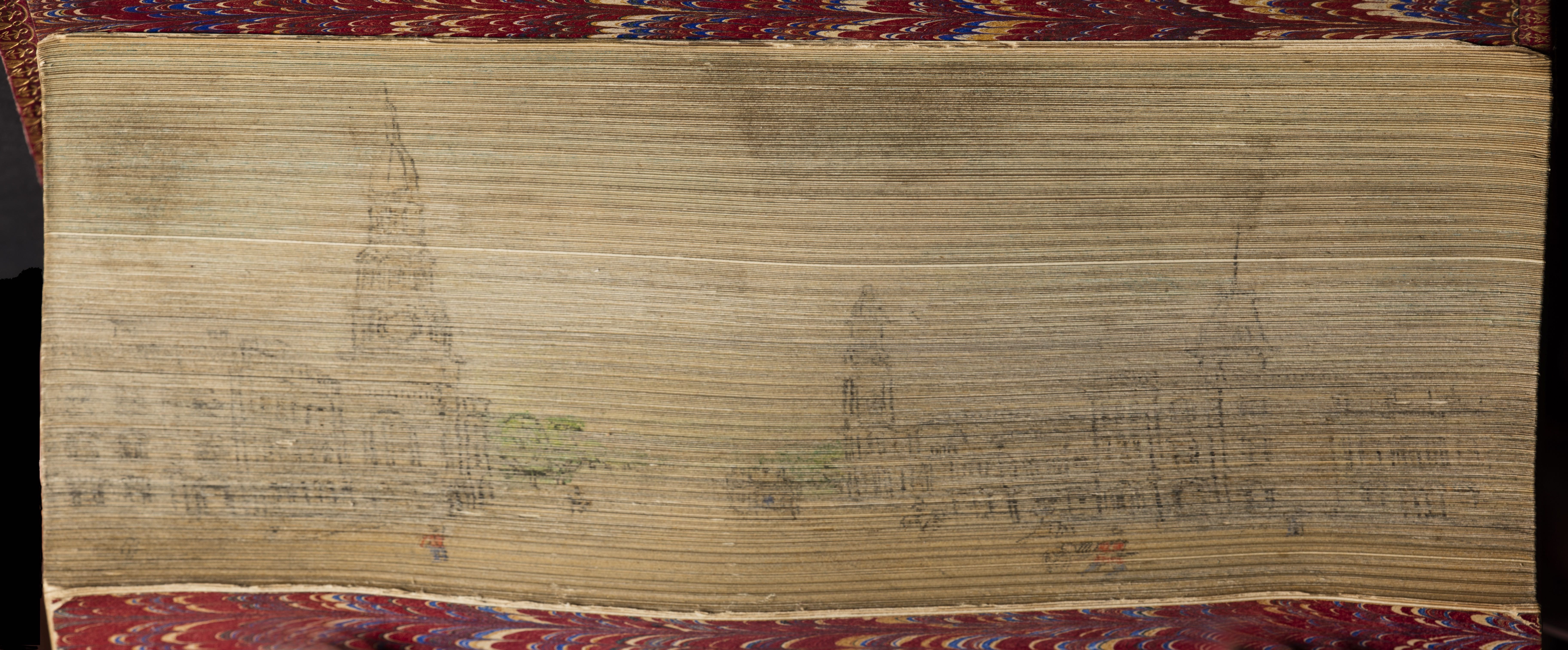 The closed booked - you can faintly see the hidden painting.
