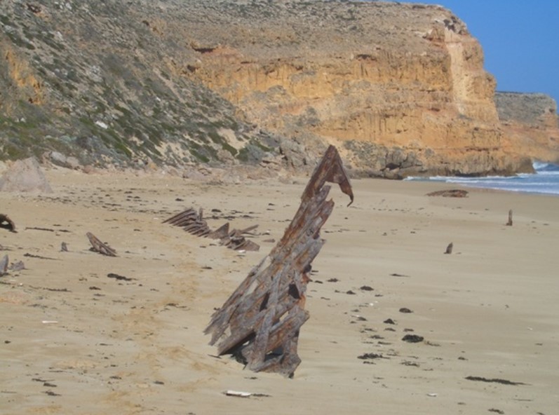 A piece of metal from the wreck of the 'Ethel' lying in the sand on the coast of Yorke Peninsula and Innes National Park, September 2007. Photographer, Mark Gilbert. SLSA: B 71296            