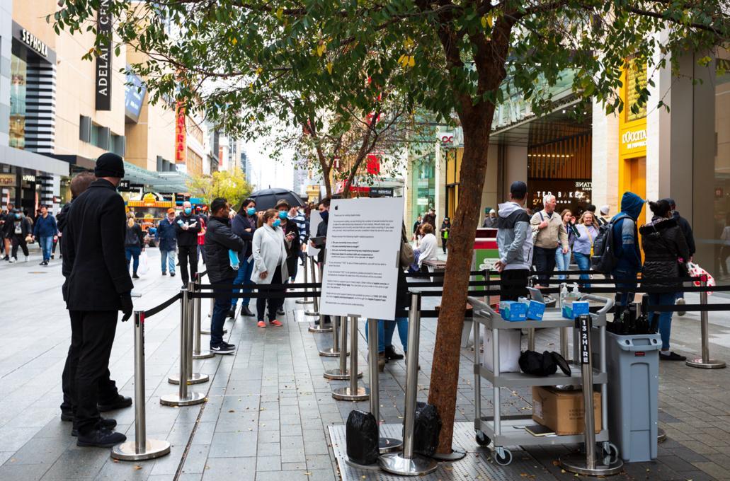 Customers queued to enter Apple Store, Rundle Mall [SLSA: B 78533/90] 