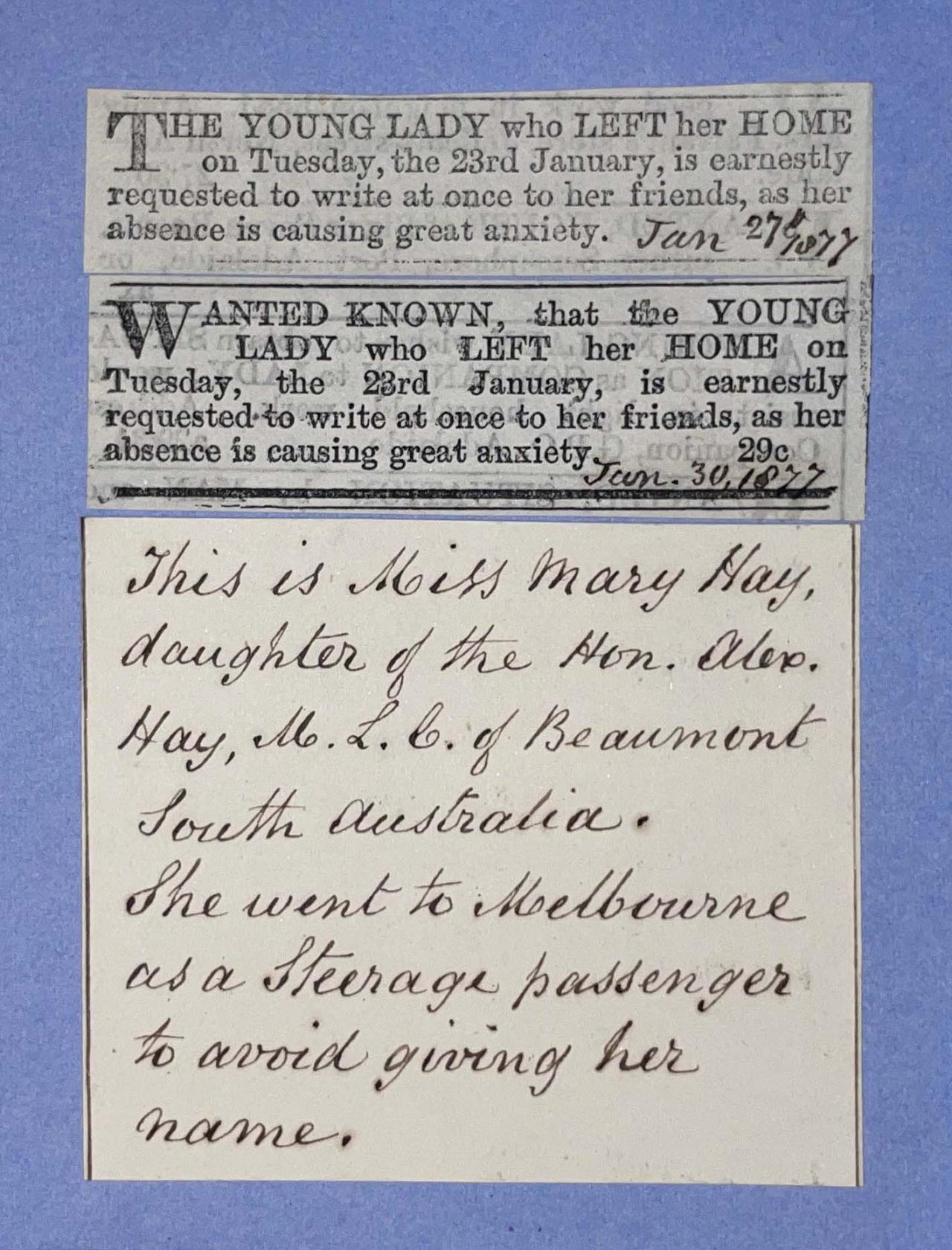Close up of the newspaper clippings in the Footprints book with a note