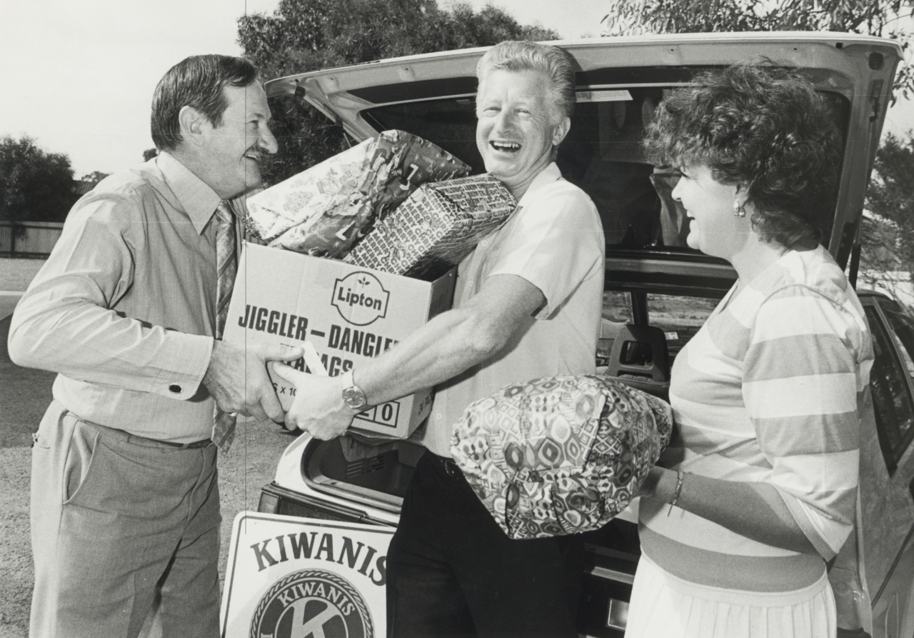 Volunteers from Reynella Kiwanis and Noarlunga Anglican Church with gifts for Christmas. SLSA: B 70869/1880