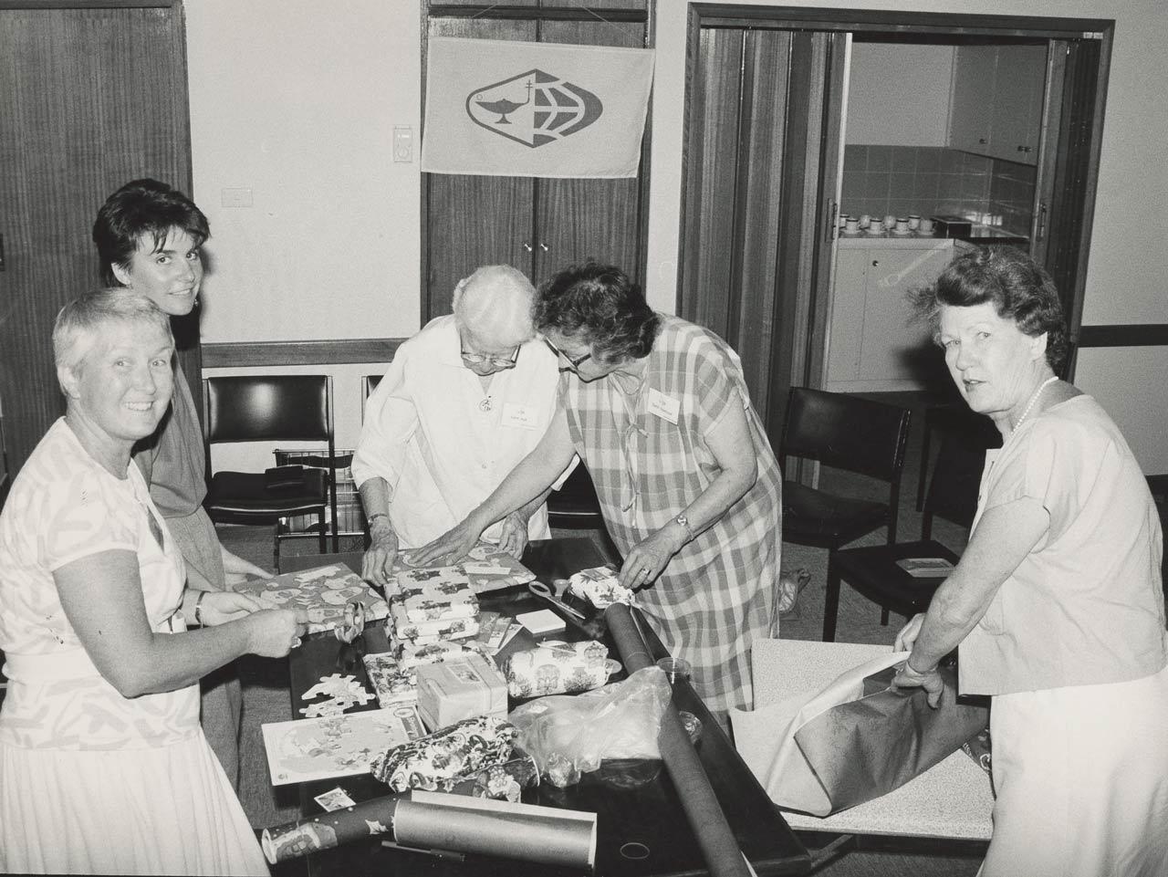 Burnside group wrapping parcels for the Christmas tree. Image courtesy of Messenger Press, 1987  SLSA: B 70869/2337
