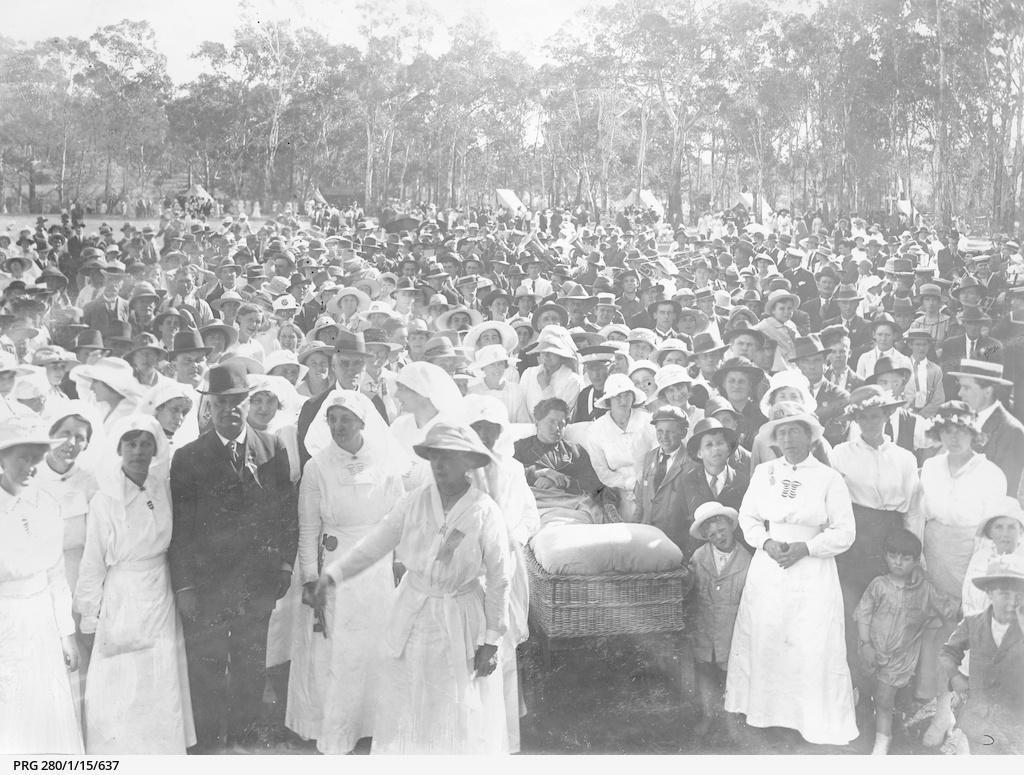 Crowds at an outdoor function held in Adelaide parklands featuring Mrs.Seager, Photo taken approximately 1918.,SLSA: PRG 280/1/15/637