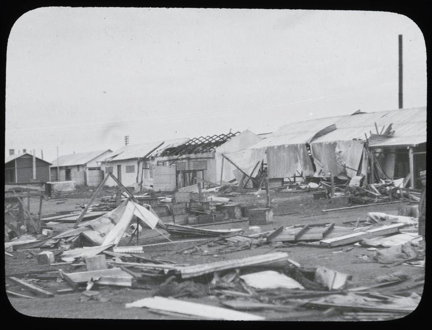 Tornado damage at Barmera showing row of damaged houses-c 1924