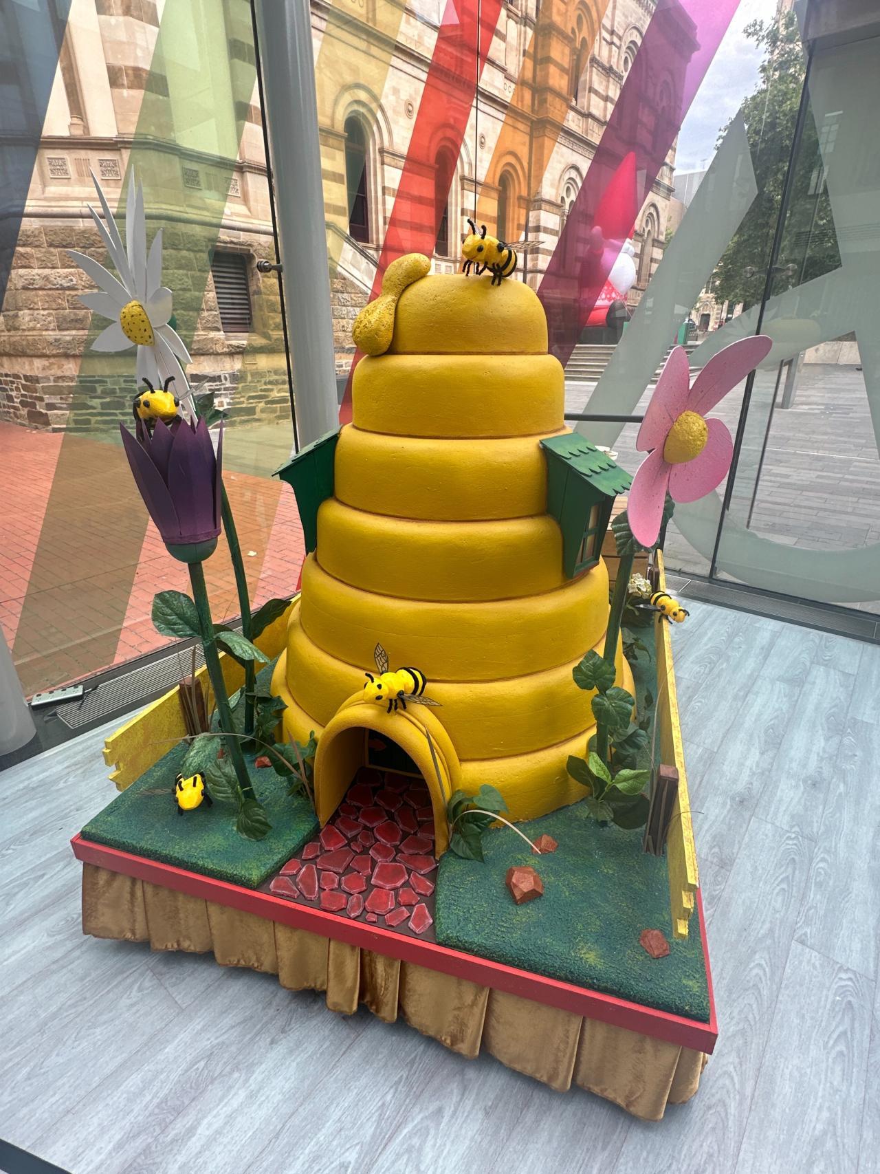 Bee Merry mini float in the foyer of the State Library for Christmas at the Mortlock 2024