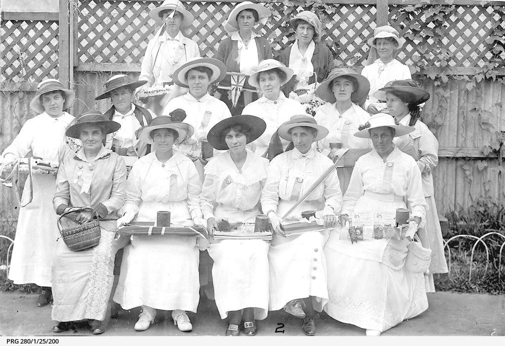  group of workers carry trays of buttons to sell during a carnival held at Semaphore in 1919. SLSA: PRG 280/1/25/200