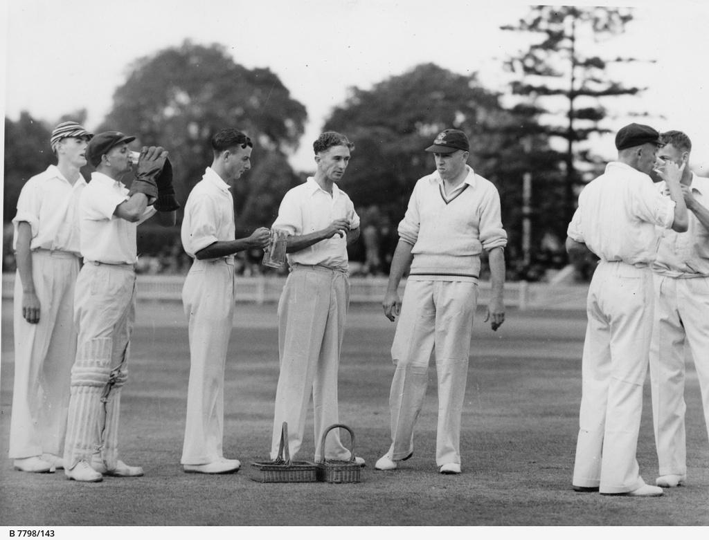A break during a cricket match between West Torrens and another team, 1940.