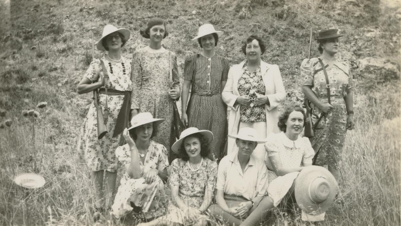 After shooting practice Carrick Hill. Natalia Davies seated third left. Amylis Laffer standing centre. SLSA: PRG 925/13/26