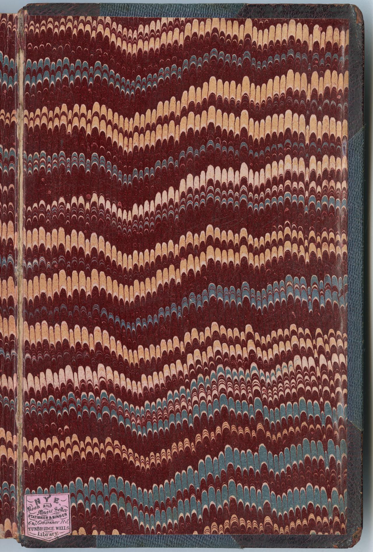 The full back cover with the sticker down the bottom left hand corner.