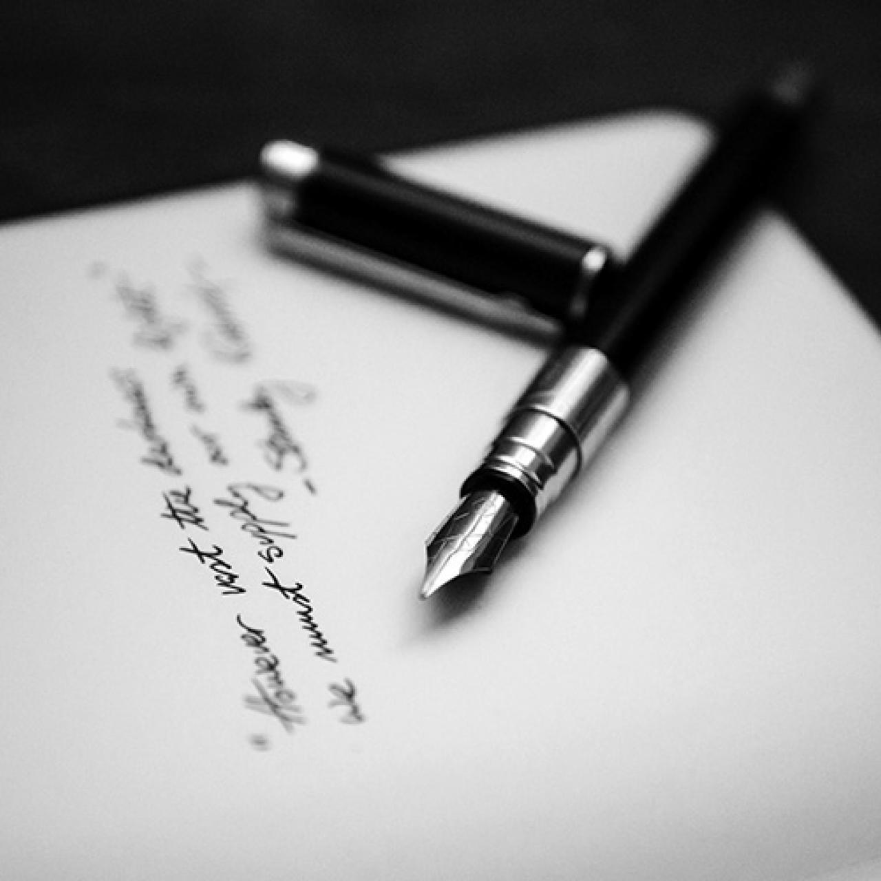 Fountain pen and paper by Alvaro Serrano. Unsplash.