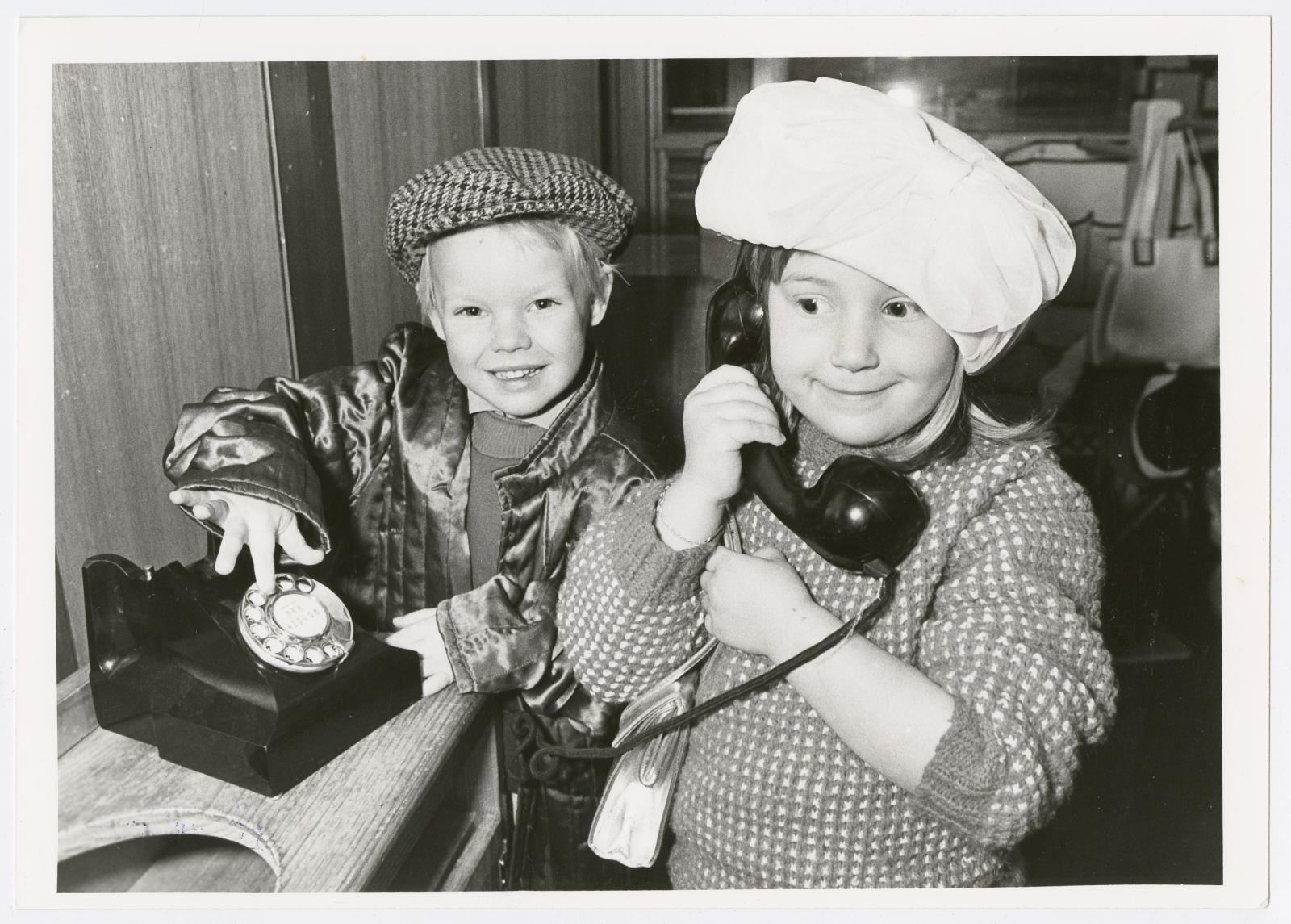 Messenger press collection - You dial and I'll do the talking. Jarrod and Jessica, both 4, on the phone at the St Peters childcare centre, 1988. SLSA: B 70869/11977