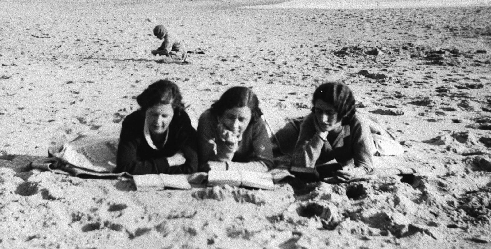Women reading on Port Noarlunga beach, 1932. SLSA: B 61807