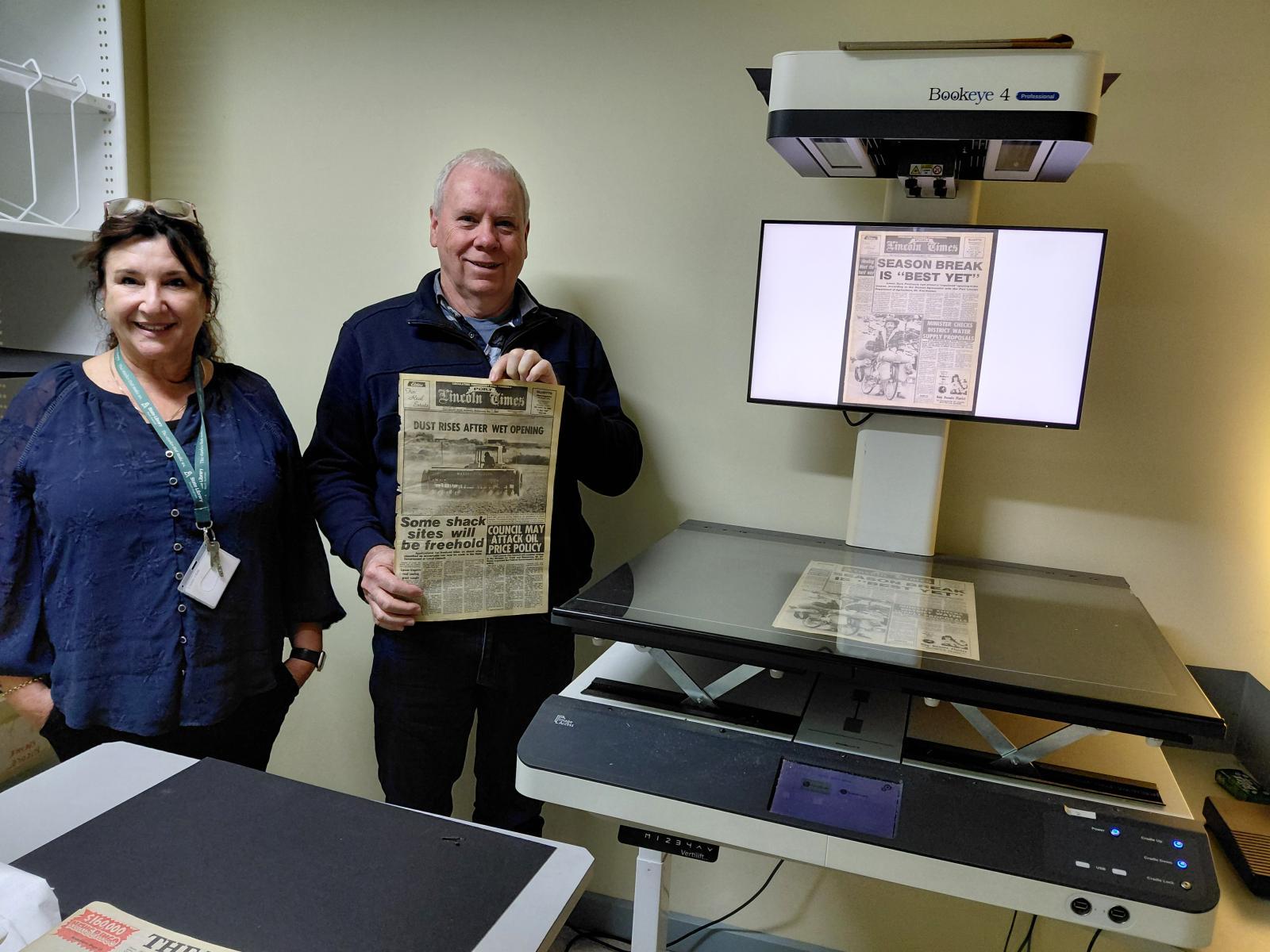 Nicole Spence, Senior Digitising Officer and Chris Mantle, with a scanners used for some of the ‘TROVE – Port Lincoln Times project’. Photographer, Rob Chadbourne.