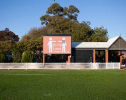 Health advice at Unley Oval [SLSA: B 78533/12]