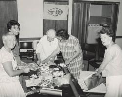 Burnside group wrapping parcels for the Christmas tree. Image courtesy of Messenger Press, 1987  SLSA: B 70869/2337