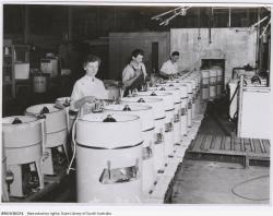 Workers on the factory floor, producing washers, c1950. SLSA: BRG 9/36/214 