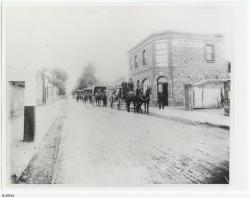 Horsedrawn Funeral cortege, Tod Street, outside the premises of Taylor & Forgie builders and undertakers. SLSA: B 47014