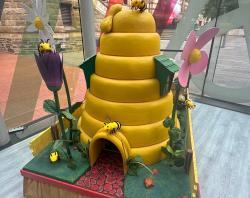 Bee Merry mini float in the foyer of the State Library for Christmas at the Mortlock 2024