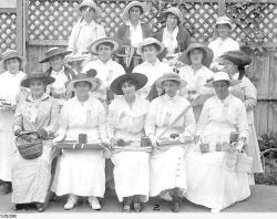  group of workers carry trays of buttons to sell during a carnival held at Semaphore in 1919. SLSA: PRG 280/1/25/200
