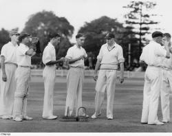 A break during a cricket match between West Torrens and another team, 1940.