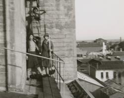 Climbing up the roof of the Duncan building for roof watching.