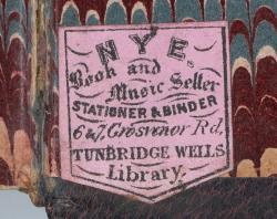 Book sticker on the back end page with the words 'Nyes book and music seller, stationer and binder, and library, 6 and 7 Grosvenor Rd, Tunbridge Wells.