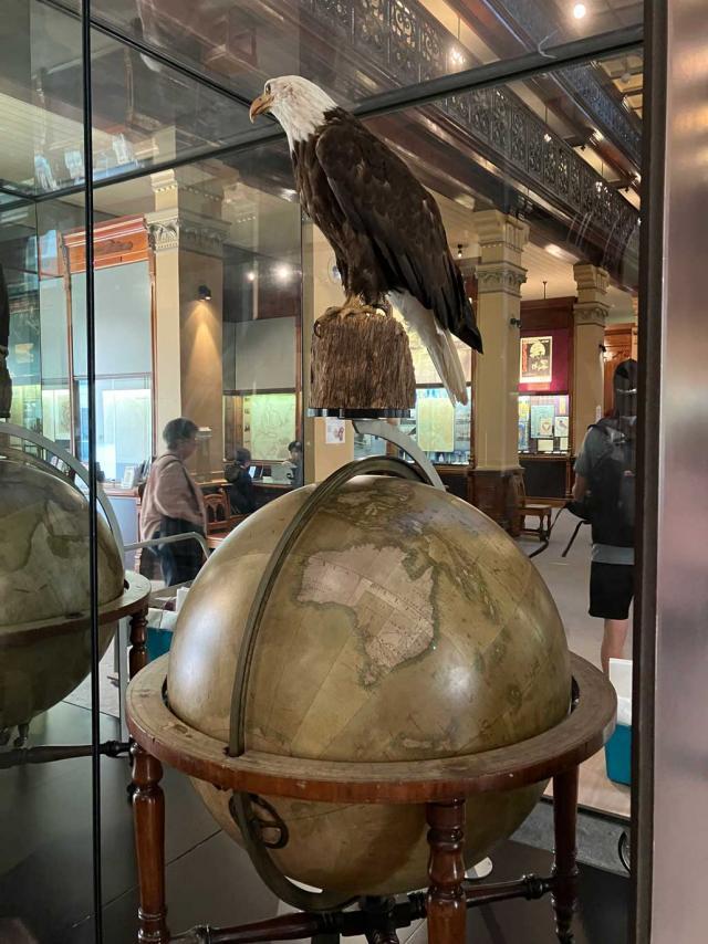 Globe and eagle display in the Mortlock Chamber, removed in April 2023.