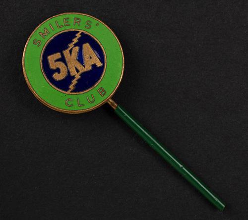 '5KA Smilers' Club', green and blue enamel lapel or hat pin ca. 1939, 2cm. SLSA: clrcri22706379/4