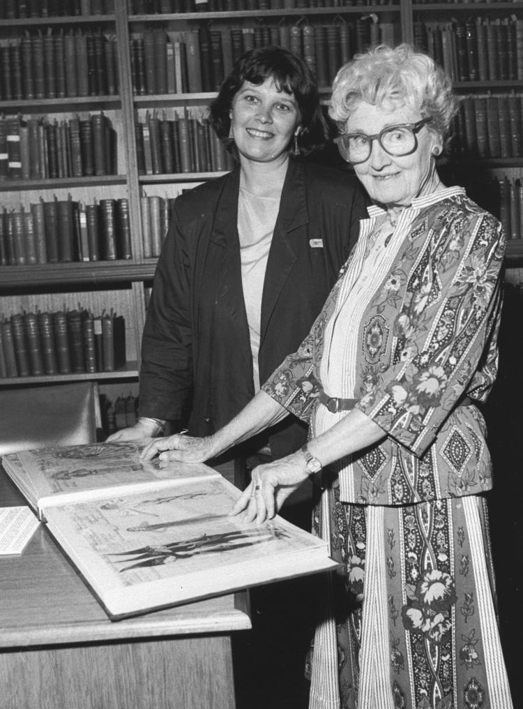 Thelma Afford viewing costume designs with Margy Burns, 1986