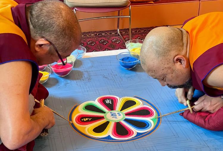 Buddhist Monks designing mandala